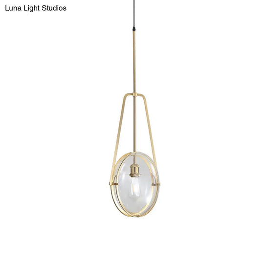 Modern Brass Pendant Light With Clear Glass Shade And Unique Halberd Frame