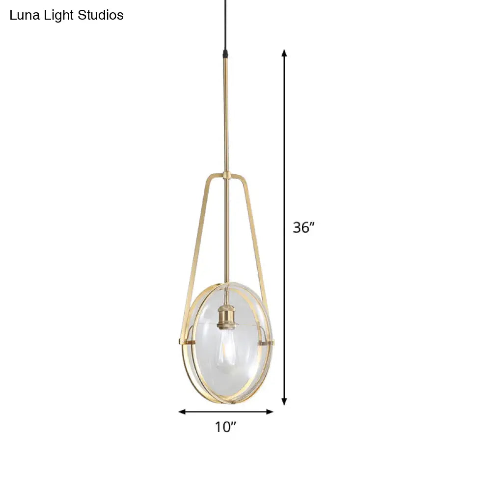 Modern Brass Pendant Light With Clear Glass Shade And Unique Halberd Frame