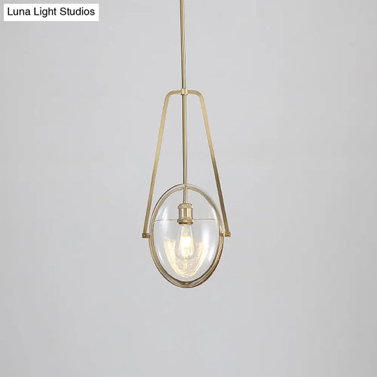 Contemporary Brass Oval Pendant Light With Clear Glass And Halberd Frame - 1-Light Ceiling Lamp