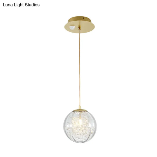 Modern Brass Pumpkin Ball Pendant Lamp With Clear Glass For Bedside Lighting