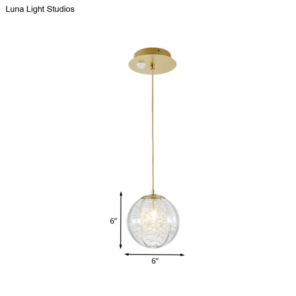 Modern Brass Pumpkin Ball Pendant Lamp With Clear Glass For Bedside Lighting