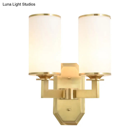 Modern Brass Wall Lamp With Frosted Opal Cylindrical Shade