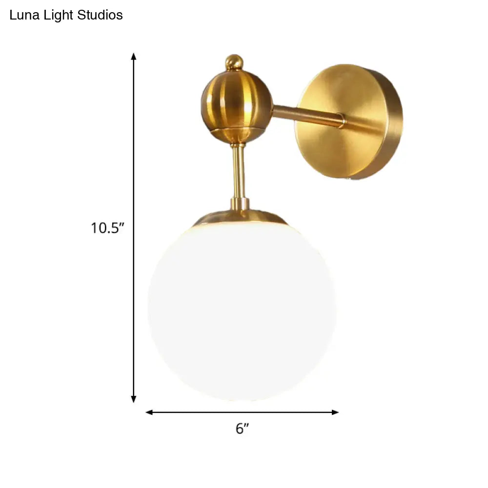 Modern Brass Wall Sconce Lamp With Adjustable Node - White Glass Globe Design