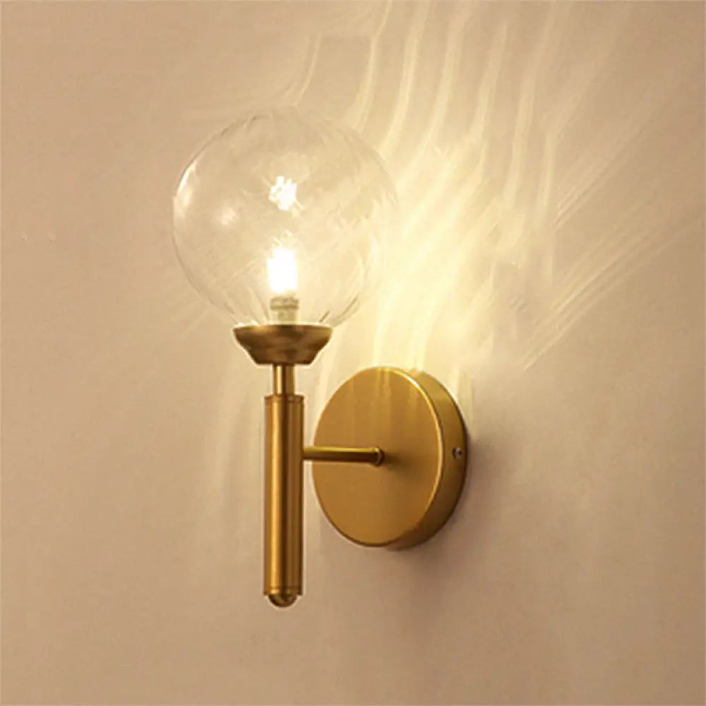 Modern Brass Wall Sconce Light - Clear Glass Sphere For Bedroom