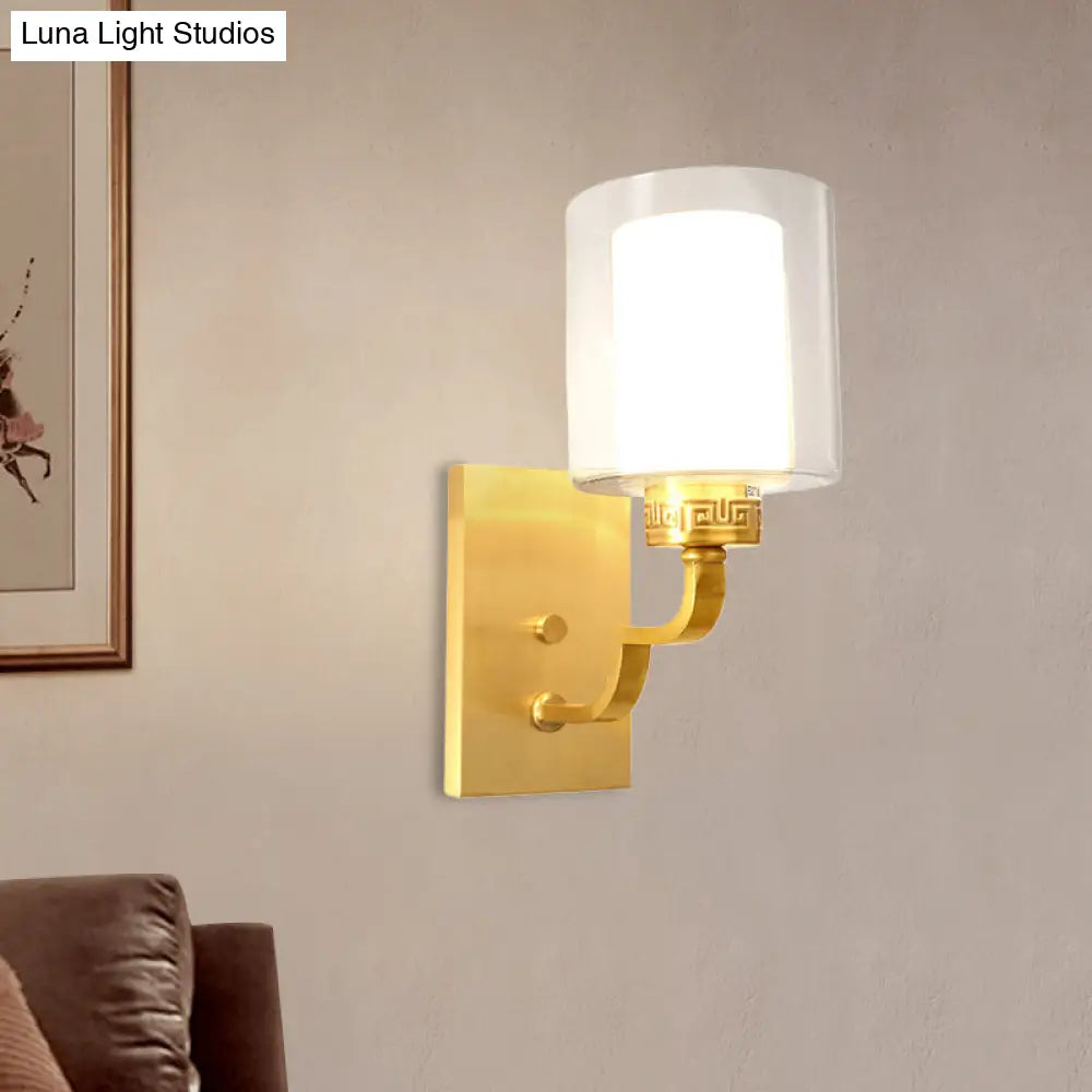 Modern Brass Wall Sconce With Cylinder Shade & Clear/White Glass - Bedroom Lighting Solution