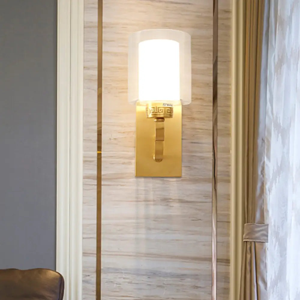 Modern Brass Wall Sconce With Cylinder Shade & Clear/White Glass - Bedroom Lighting Solution