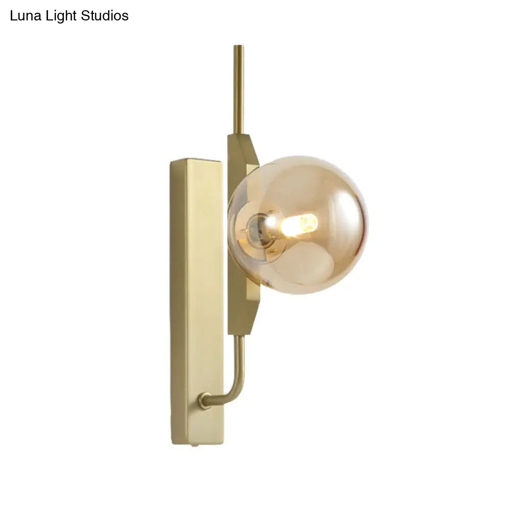 Modern Brass Wall Sconce With Sphere Glass Shade - Led Bedroom Lighting In Smoky/White/Amber