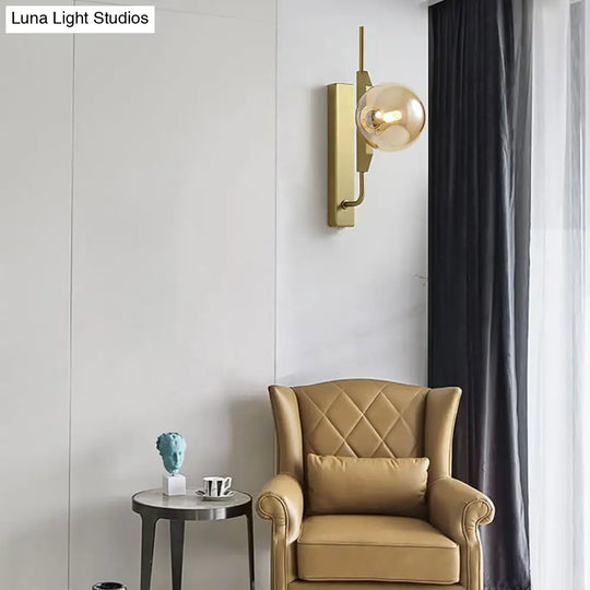 Modern Brass Wall Sconce With Sphere Glass Shade - Led Bedroom Lighting In Smoky/White/Amber