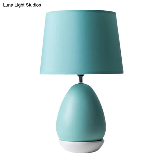 Modern Ceramic Egg-Shaped Bedside Night Light With Blue Drum Fabric Shade