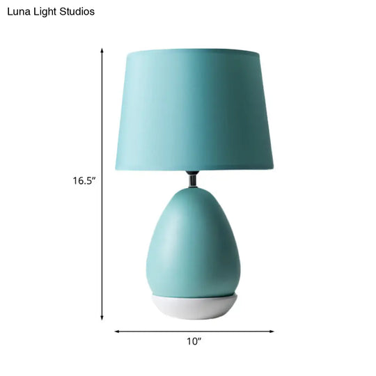 Modern Ceramic Egg-Shaped Bedside Night Light With Blue Drum Fabric Shade