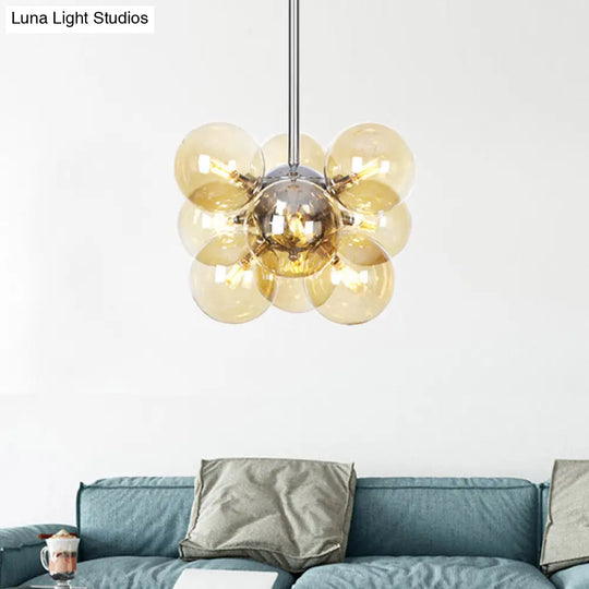 Contemporary 9-Light Chrome Orb Pendant Chandelier With Amber Glass Shades