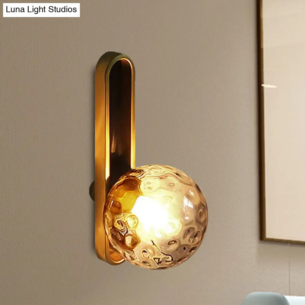 Modern Clear/Cream Glass Orb Wall Light With Brass Mount