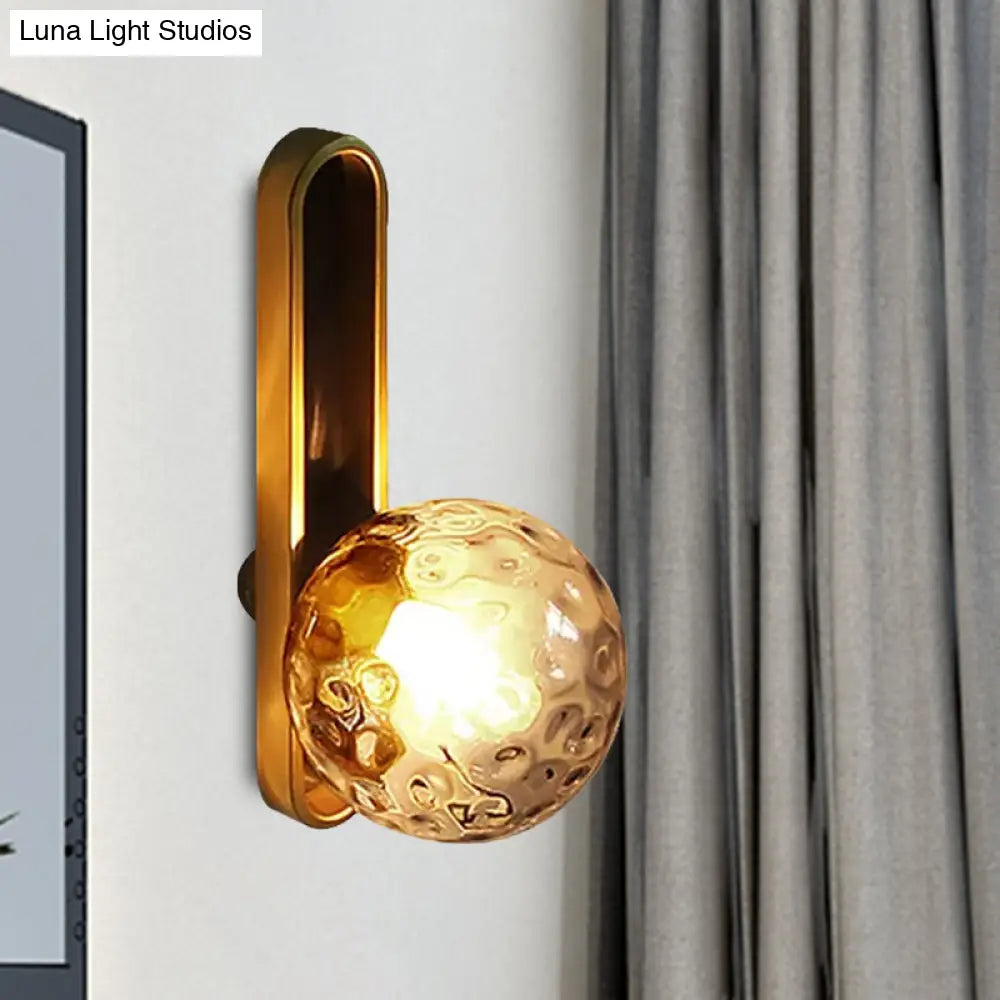 Modern Clear/Cream Glass Orb Wall Light With Brass Mount