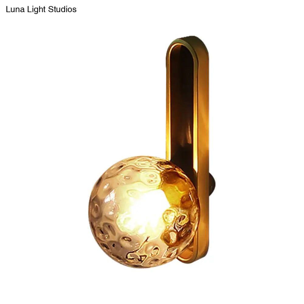 Modern Clear/Cream Glass Orb Wall Light With Brass Mount