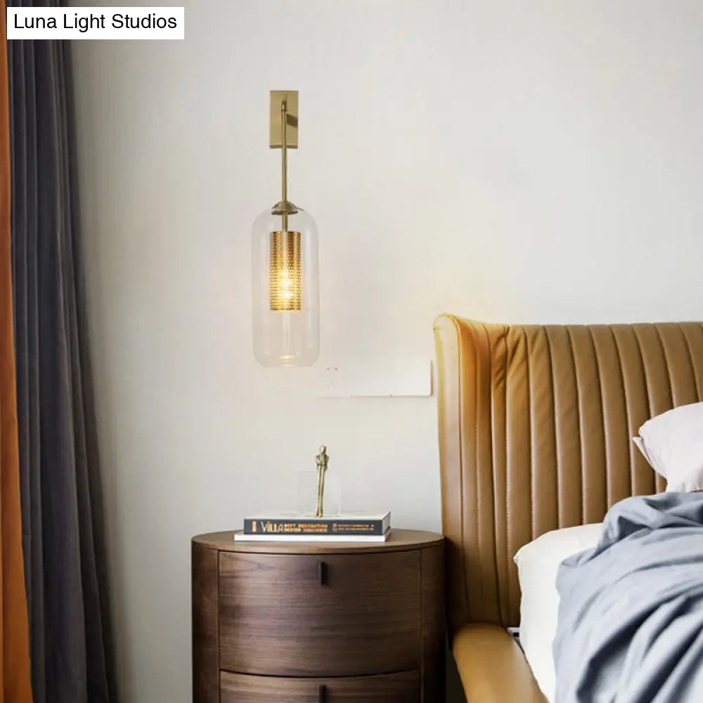 Modern Clear Glass Capsule Wall Light Sconce With Gold Arm - Stylish Indoor Lighting