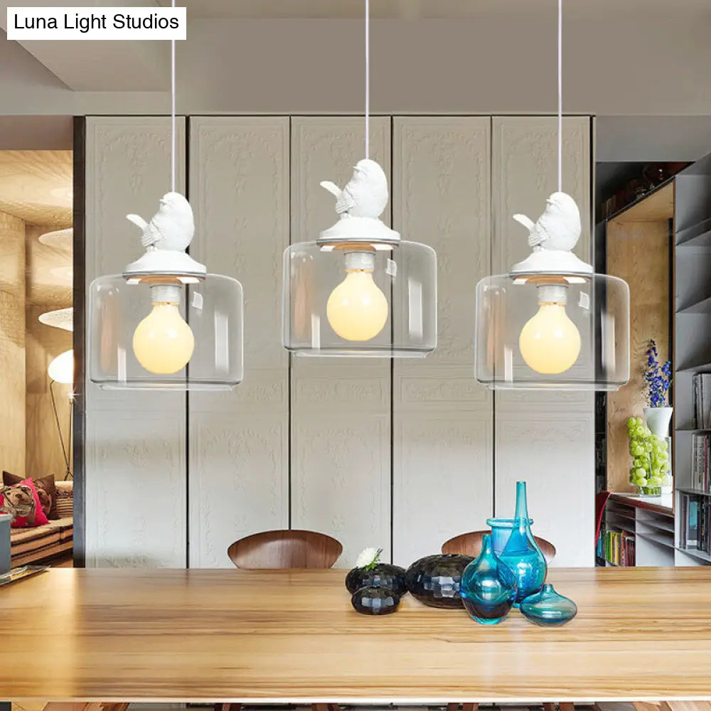 Modern Drum Shaped Dinette Pendant Lamp With Clear Glass And White Bird Top