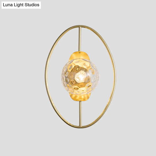 Modern Clear Glass Orb Sconce Lamp - 1-Bulb Black/Gold Wall Light With Ring Detail