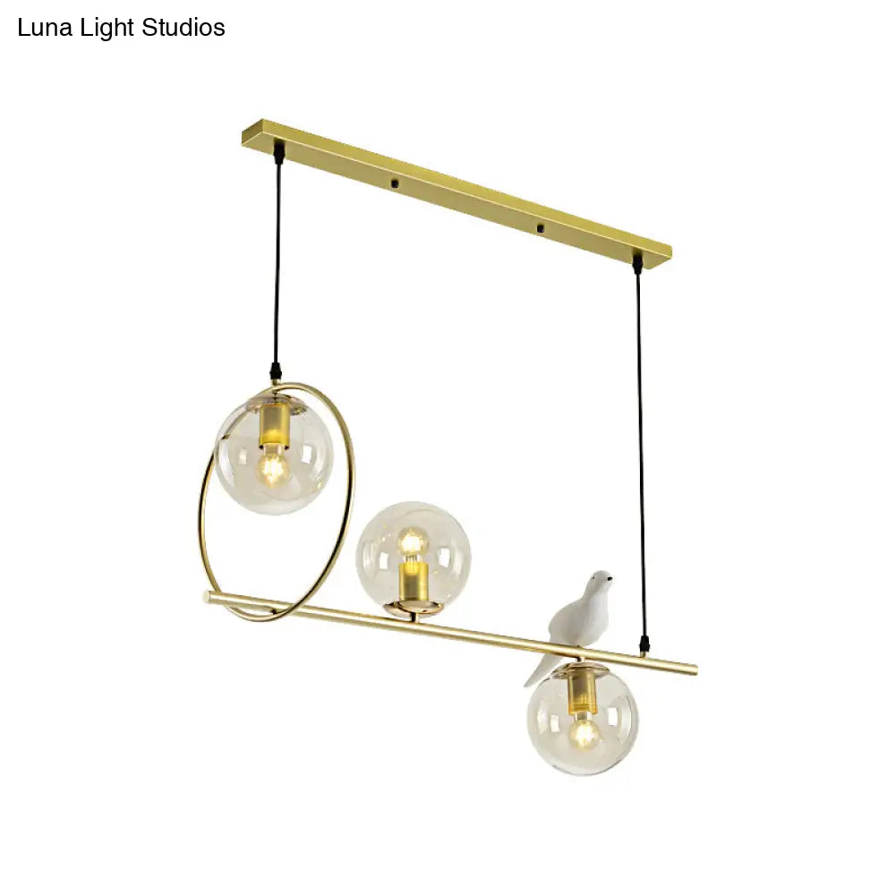 Modern Clear Glass Pendant Light Fixture With White Bird - Global Island Lamp Gold Trim 3 Heads