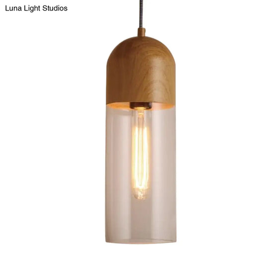 Modern Clear Glass Pendant Light: Sleek Half-Capsule Design Wood Fixture For Bedroom