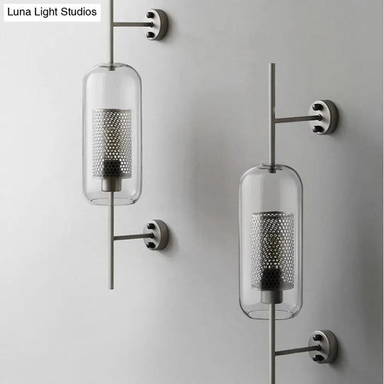 Modern Clear Glass Pill Capsule Wall Sconce With Mesh Screen - 1-Bulb Bathroom Lighting Fixture