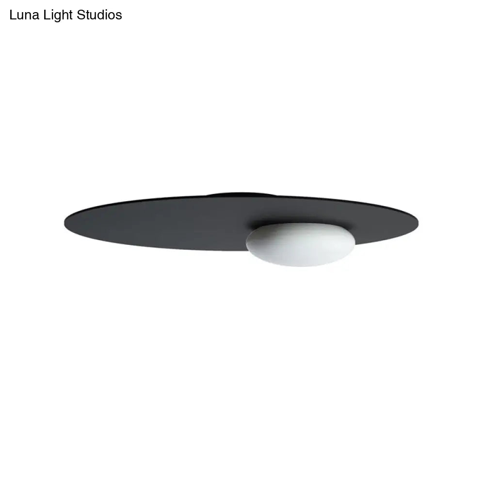 Modern Cream Glass Flush Mount Lamp: Designer 1-Light Ceiling Fixture With Black/Brass Disk Top