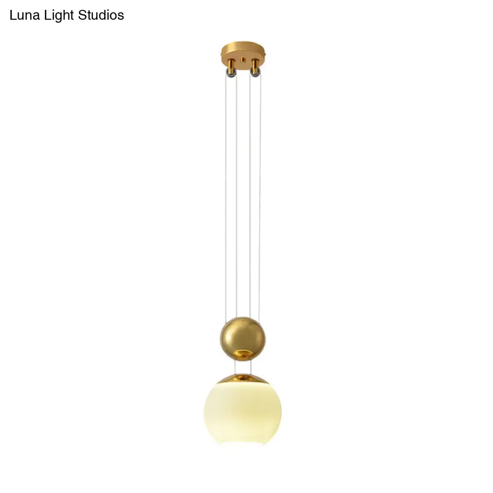 Modern Cream Glass Sphere Pendant Ceiling Lamp With Gold Finish - Ideal For Restaurants