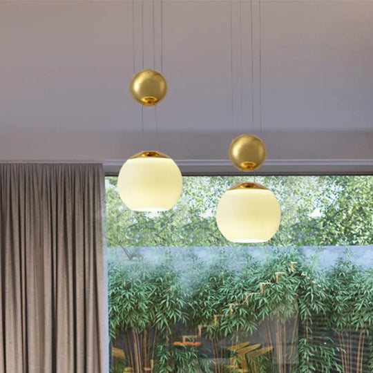 Modern Cream Glass Sphere Pendant Ceiling Lamp With Gold Finish - Ideal For Restaurants