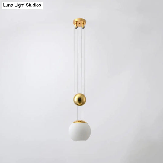 Modern Cream Glass Sphere Pendant Ceiling Lamp With Gold Finish - Ideal For Restaurants