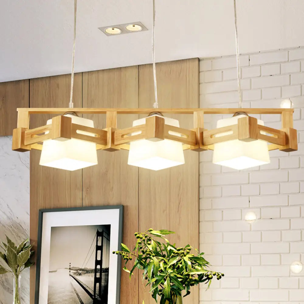 Modern Cubic Frosted Glass Island Pendant Lamp With Wood Cage And 3 Beige Bulbs