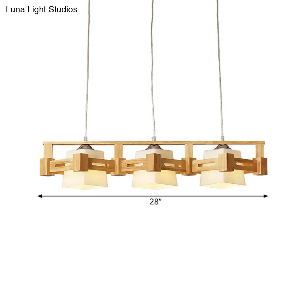 Modern Cubic Frosted Glass Island Pendant Lamp With Wood Cage And 3 Beige Bulbs