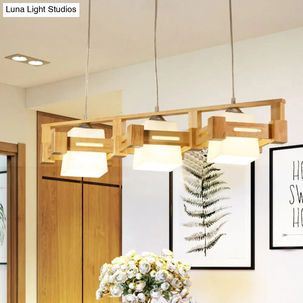 Modern Cubic Frosted Glass Island Pendant Lamp With Wood Cage And 3 Beige Bulbs