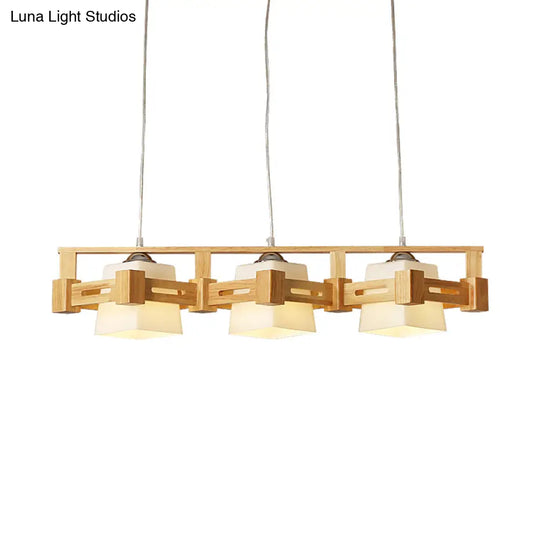 Modern Cubic Frosted Glass Island Pendant Lamp With Wood Cage And 3 Beige Bulbs