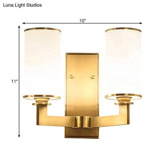 Modern Cylinder Wall Lamp 1/2-Head Frosted Glass Fixture In Brass For Living Room - Modernism Style