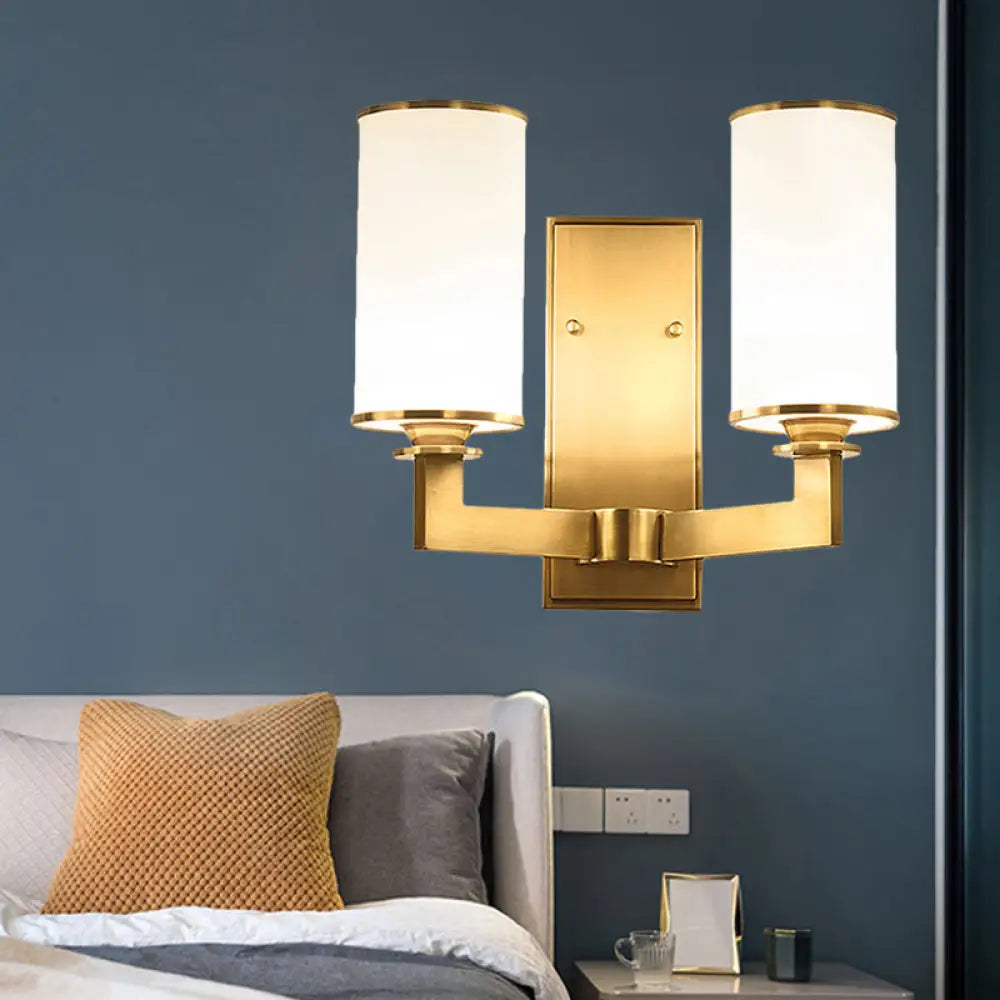 Modern Cylinder Wall Lamp 1/2-Head Frosted Glass Fixture In Brass For Living Room - Modernism Style