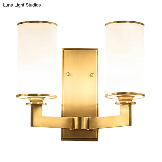 Modern Cylinder Wall Lamp 1/2-Head Frosted Glass Fixture In Brass For Living Room - Modernism Style