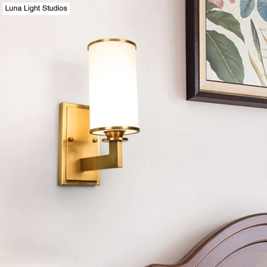 Modern Cylinder Wall Lamp 1/2-Head Frosted Glass Fixture In Brass For Living Room - Modernism Style