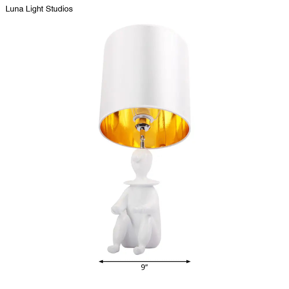 Modern Desk Lamp With Metal Cylinder Design And Sitting Boy Ideal For Kids Bedroom