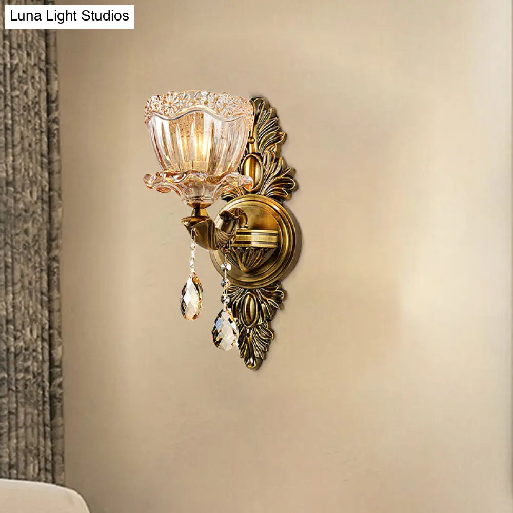 Modern Floral Shaped Wall Sconce Light With Amber Glass And Teardrop Crystal Drop In Brass - 1/2