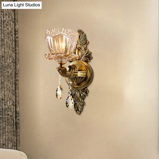 Modern Floral Shaped Wall Sconce Light With Amber Glass And Teardrop Crystal Drop In Brass - 1/2