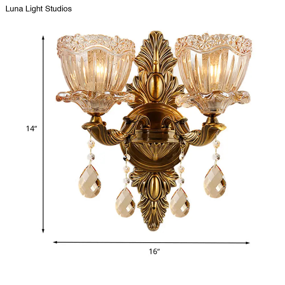 Modern Floral Shaped Wall Sconce Light With Amber Glass And Teardrop Crystal Drop In Brass - 1/2