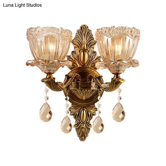 Modern Floral Shaped Wall Sconce Light With Amber Glass And Teardrop Crystal Drop In Brass - 1/2