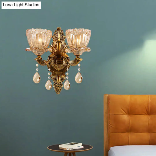 Modern Floral Shaped Wall Sconce Light With Amber Glass And Teardrop Crystal Drop In Brass - 1/2