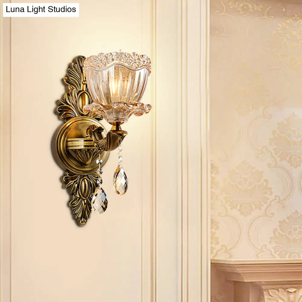 Modern Floral Shaped Wall Sconce Light With Amber Glass And Teardrop Crystal Drop In Brass - 1/2