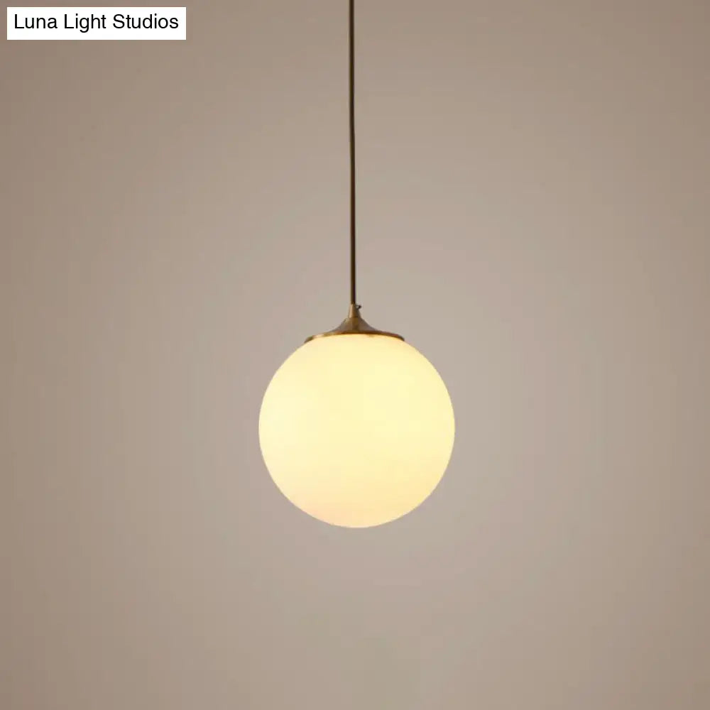 Sleek Frosted White Glass Pendant Light With Global Suspension - Ideal For Dining Rooms 1 Bulb Drop