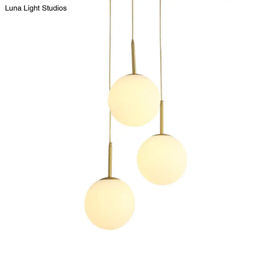 Modern White Glass Orb Hanging Ceiling Light With 3 Lights And Brass Finish