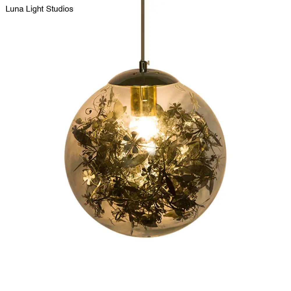 Modern Globe Pendant Light With Clear Glass And Inner Leaf Design In Silver/Gold For Bedroom