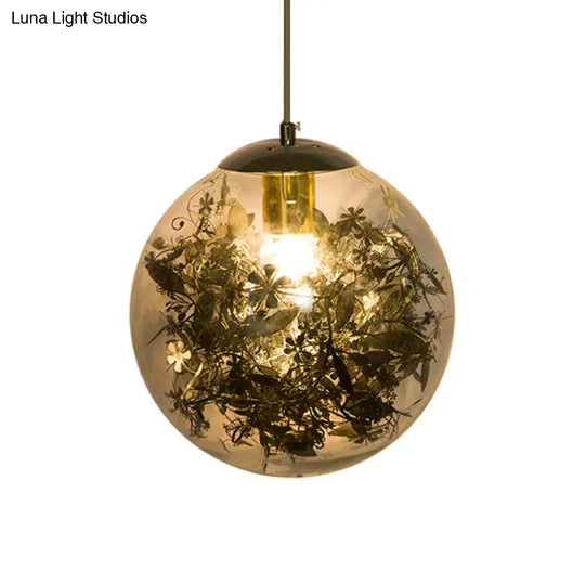 Modern Globe Pendant Light With Clear Glass And Inner Leaf Design In Silver/Gold For Bedroom