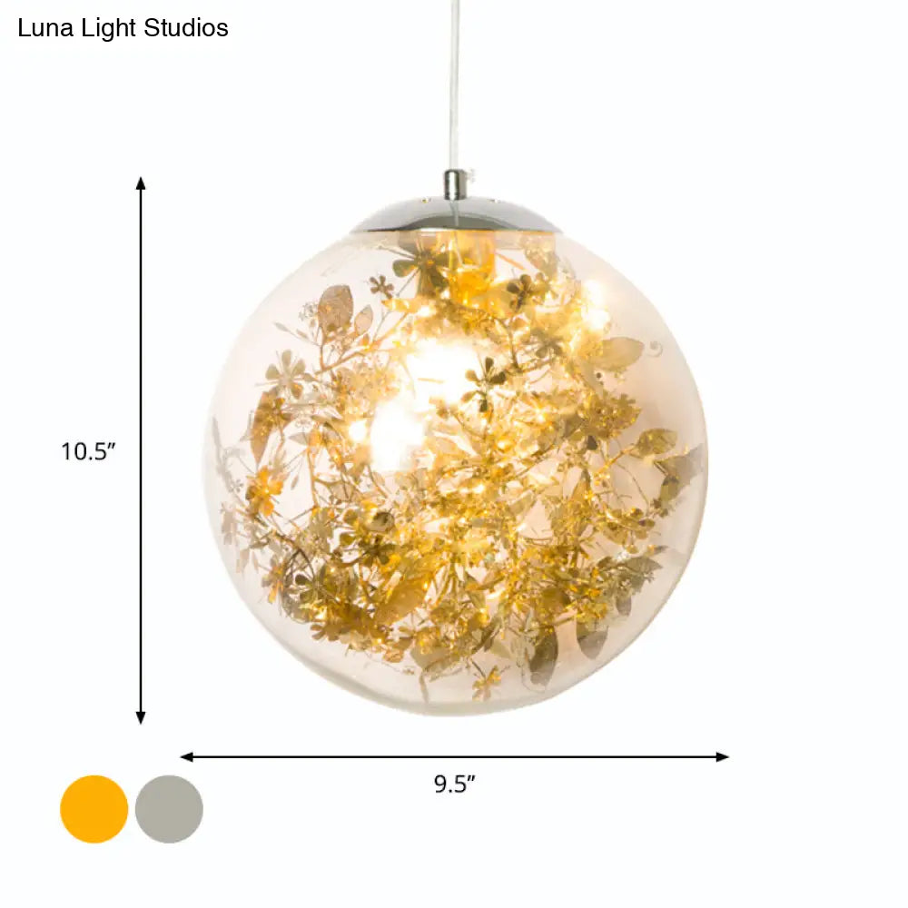 Modern Globe Pendant Light With Clear Glass And Inner Leaf Design In Silver/Gold For Bedroom