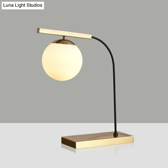 Modern Gold Linear Table Light With Milk Glass Ball Shade