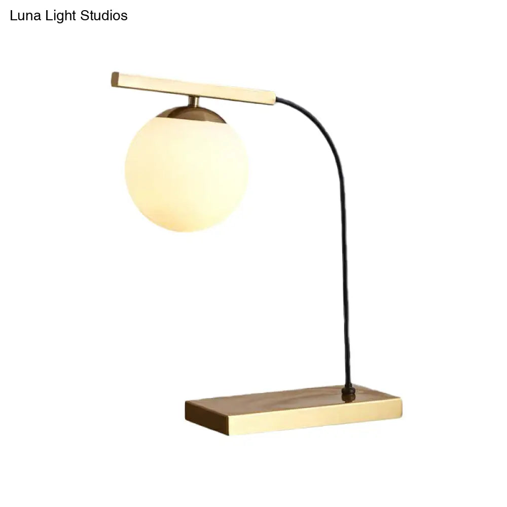 Modern Gold Linear Table Light With Milk Glass Ball Shade